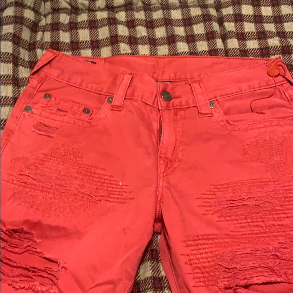 Red true religion jeans rips
